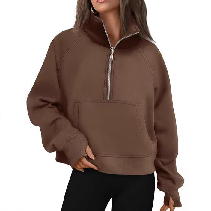 Women’s oversized half-zip sweater with kangaroo pocket, thumb holes, and high collar Mune Fashion
