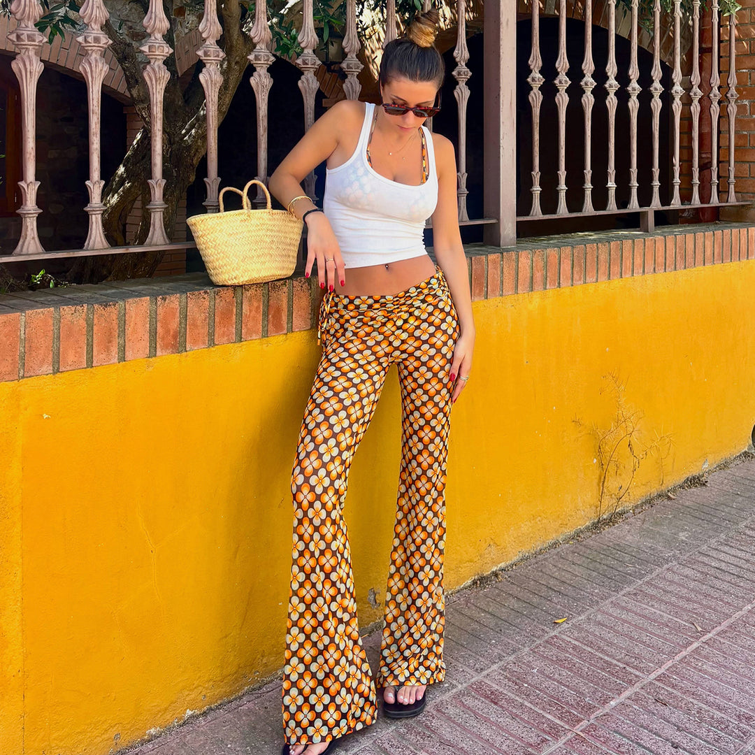 Women's flared high-waisted trousers with side drawstrings and retro floral print Mune Fashion