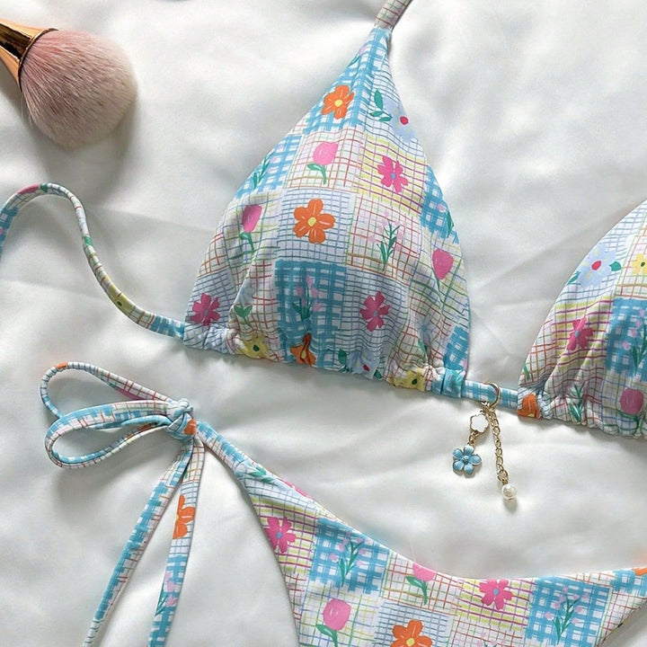 Ladies triangle bikini with playful flower details Mune Fashion