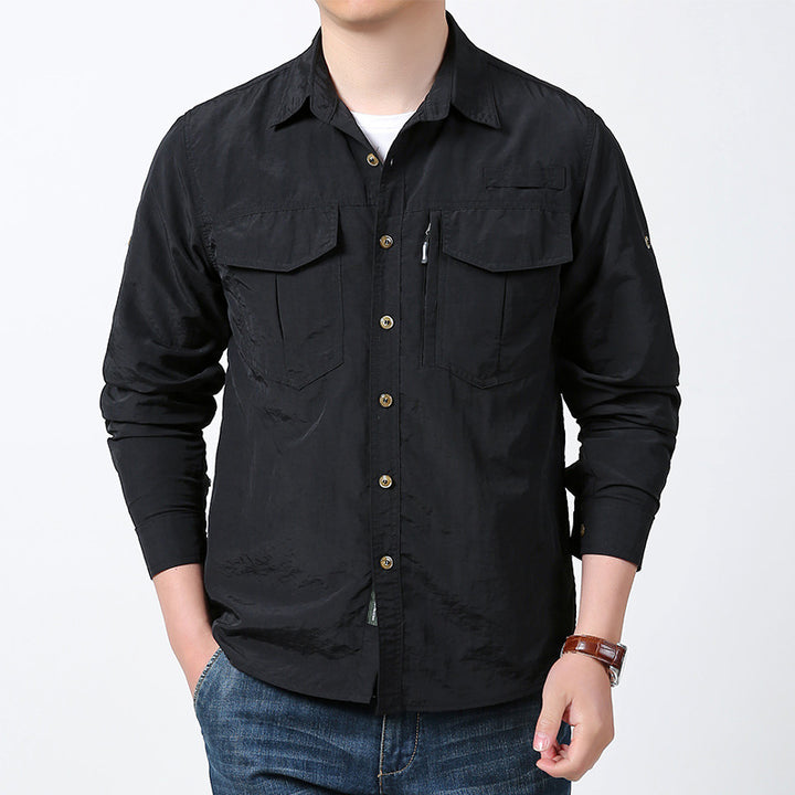 Men's long-sleeved field shirt made of lightweight ripstop with multifunctional chest pockets and concealed zip.