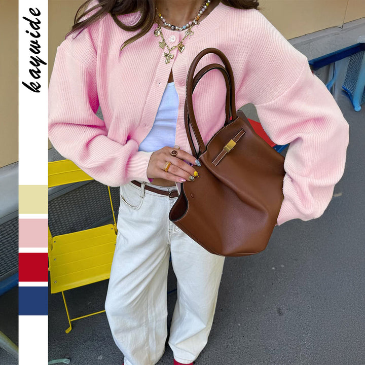 Women's short ribbed cardigan with round neckline, balloon sleeves and distinctive button placket Mune Fashion