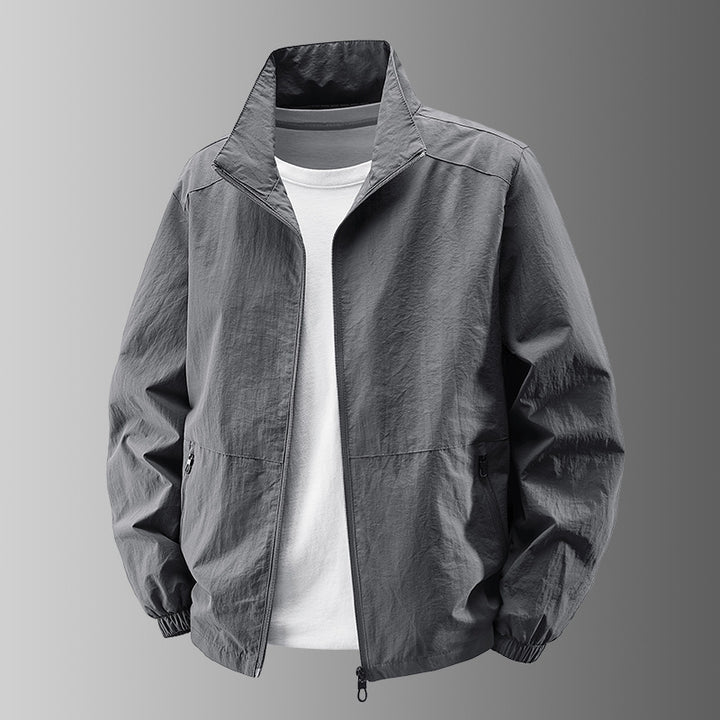 Men's breathable lightweight windbreaker with stand-up collar, elastic cuffs and concealed zippered pockets Mune Fashion