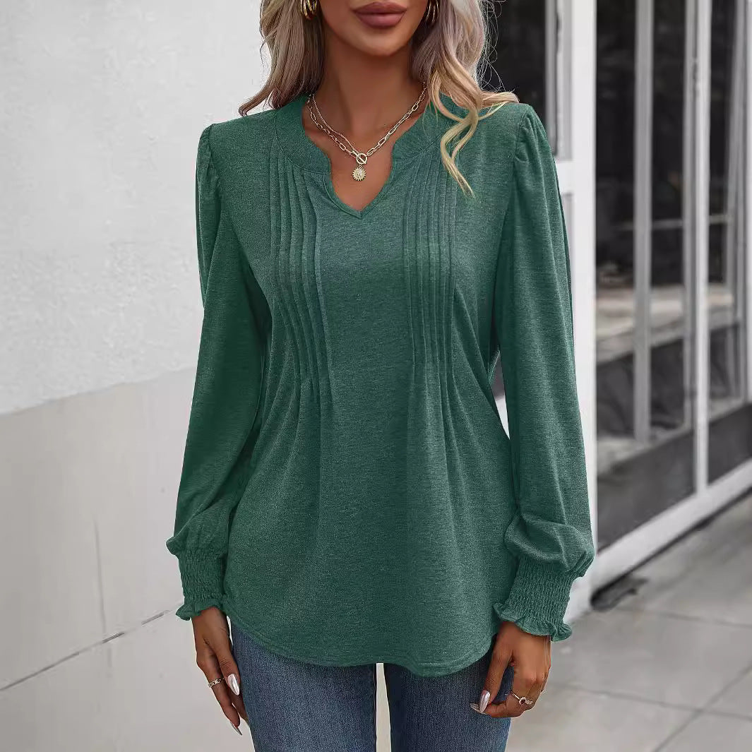 Women's long sleeve shirt with V-neckline, decorative inverted pleats at the front and elastic smocked cuffs Mune Fashion
