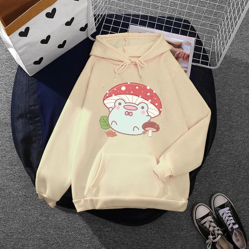 Women’s soft oversized hoodie with kawaii mushroom frog print, kangaroo pocket, and ribbed cuffs Mune Fashion