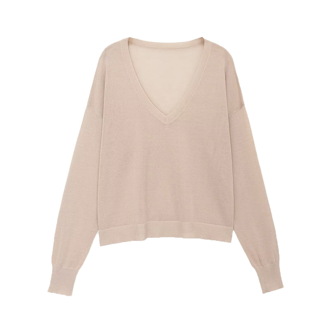 Women's oversized fine knit pullover with deep V-neckline and ribbed cuffs Mune Fashion