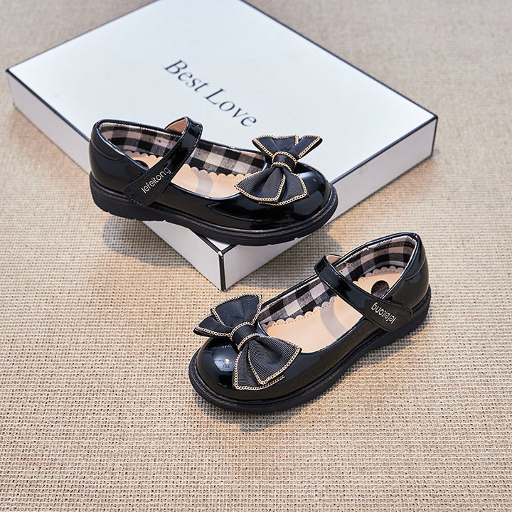 Girls' ballerina shoes with adjustable strap and decorative bow accent Mune Fashion