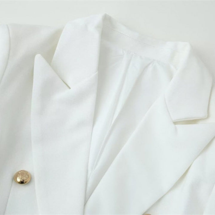 Women double-breasted longline blazer with lapel collar and decorative buttons Mune Fashion