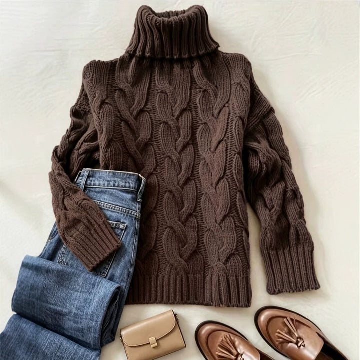 Women's chunky knit turtleneck sweater with distinctive cable patterns and ribbed cuffs Mune Fashion