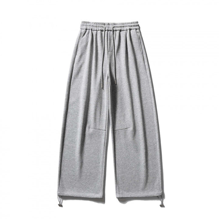 Unisex Wide Sweatpants with drawstring waistband, cord drawstring, and adjustable leg straps Mune Fashion