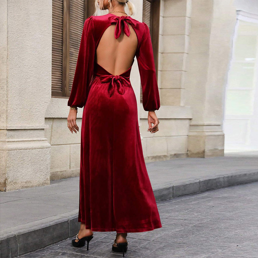 Ladies' elegant velvet maxi dress with fitted corset, long balloon sleeves, and flowing A-line skirt Mune Fashion
