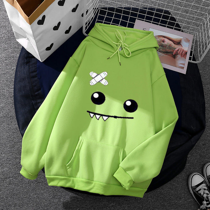 Women's hoodie with playful monster face, bandage application and kangaroo pocket Mune Fashion