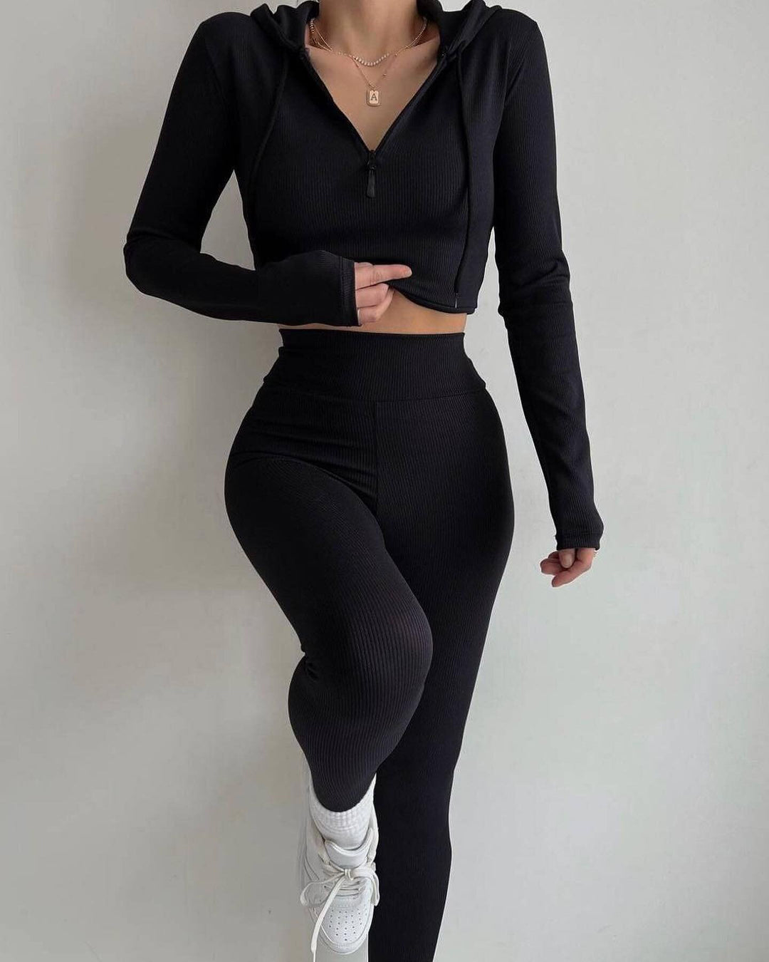 Women's fitted rib jersey half-zip set with tailored long sleeve and high-waist leggings Mune Fashion