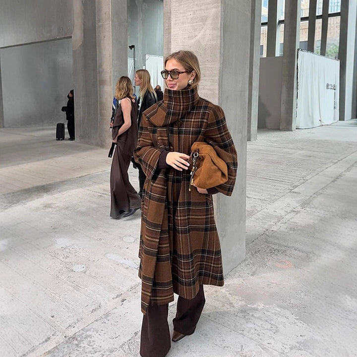 Ladies long coat in check look made of wool mix with oversized stand-up collar and bell sleeves Mune Fashion