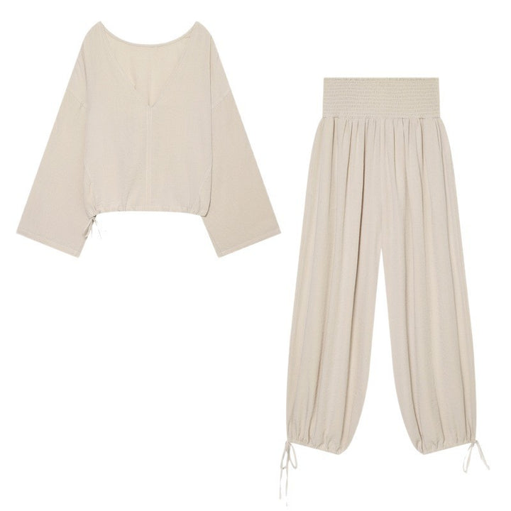 Women’s harem pants with high smock waistband, wide fall and adjustable cord closures Mune Fashion