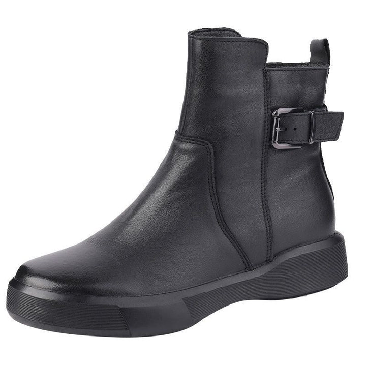 Ladies ankle-height leather-look sneaker boots with adjustable heel strap, pull tab, and non-slip rubber sole Mune Fashion