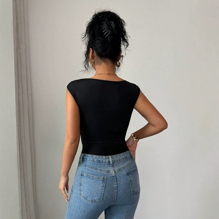 Women's body-shaping high-cut bodysuit with asymmetric strap and decorative metal ring Mune Fashion