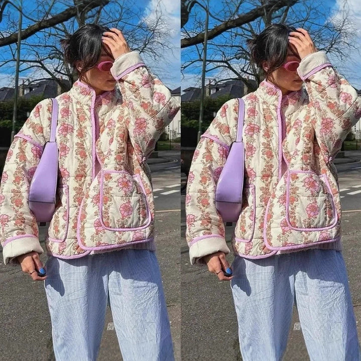 Women's nan quilted stand-up collar jacket with floral vertical print, patch pockets, and contrasting piping Mune Fashion