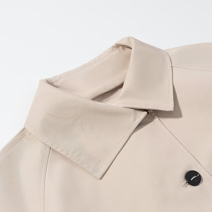 Women's short trench-style jacket with boxy silhouette and raglan sleeves Mune Fashion