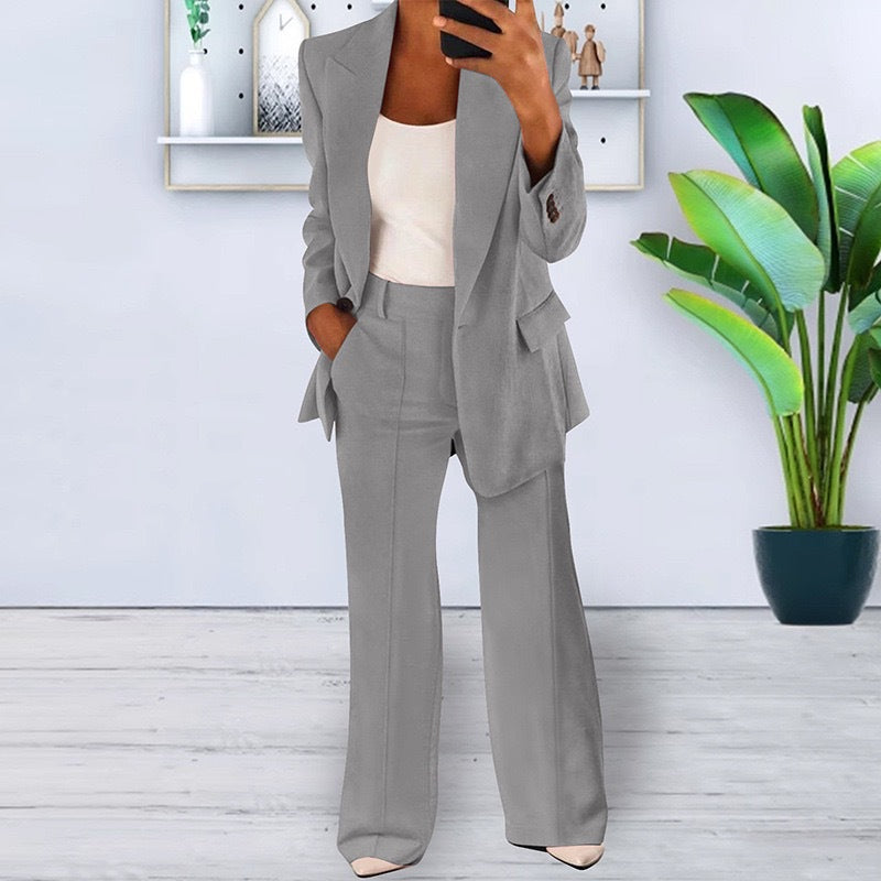 Women’s office-appropriate pantsuit set with wide trousers and tailored blazer Mune Fashion