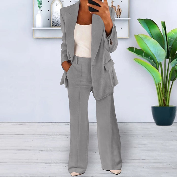 Women’s office-appropriate pantsuit set with wide trousers and tailored blazer Mune Fashion