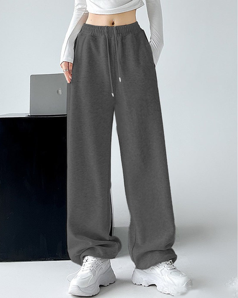 Ladies Nan extra wide palazzo sweatpants with high comfort waistband, side pockets, slit at hem and drawstring Mune Fashion