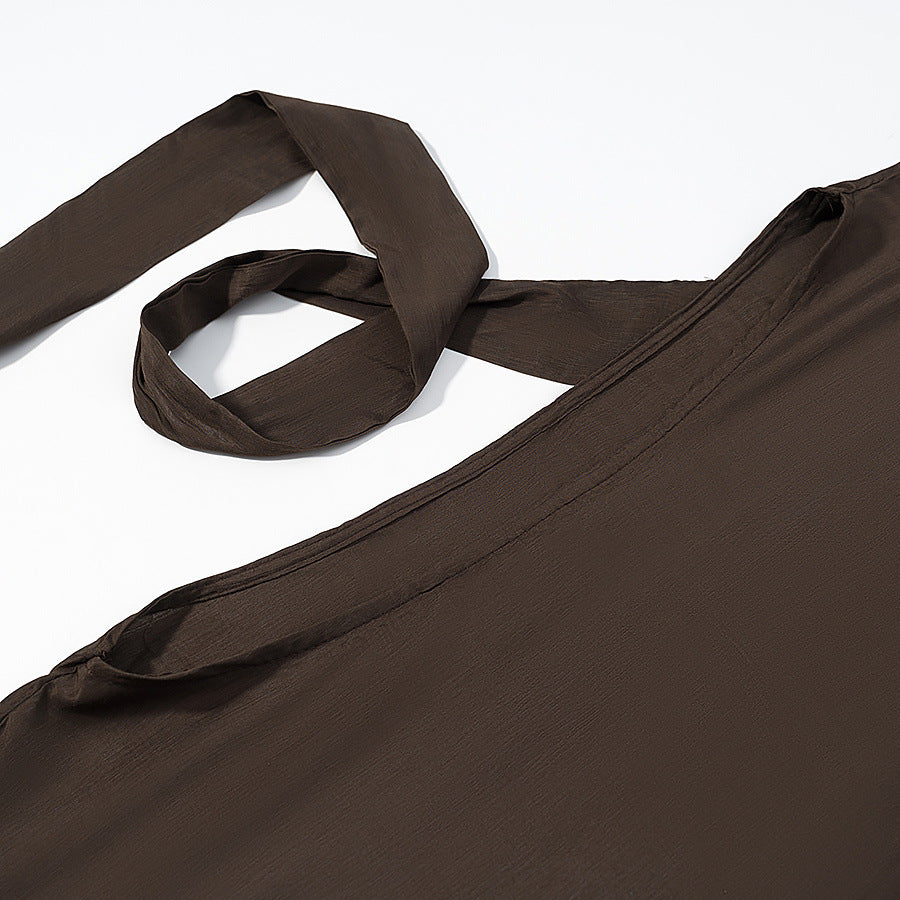 Women’s flowing cape poncho with bow, asymmetrical pointed hem and eyelet trim Mune Fashion
