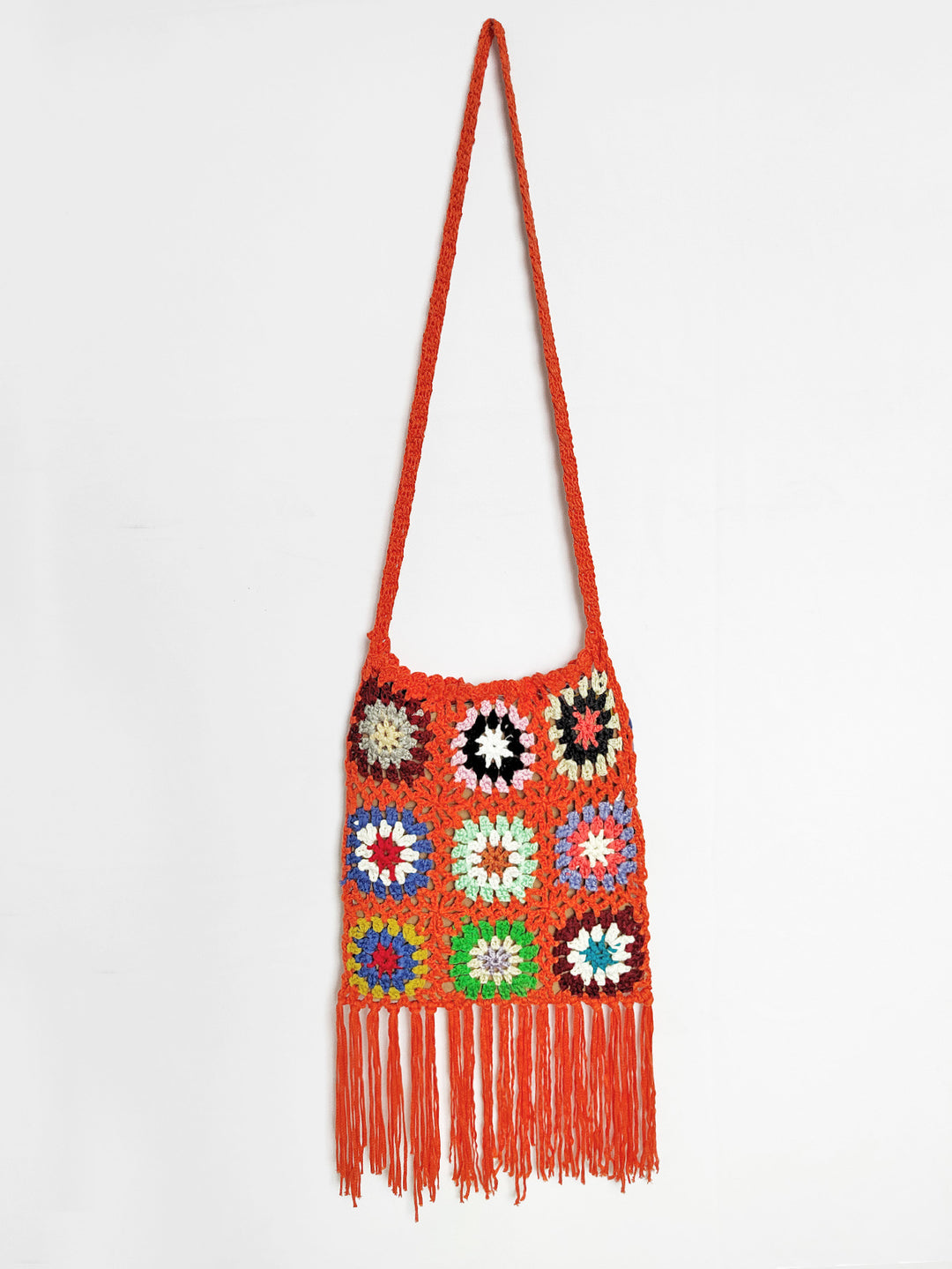 Women crocheted shoulder bag with colorful floral patterns and fringes Mune Fashion