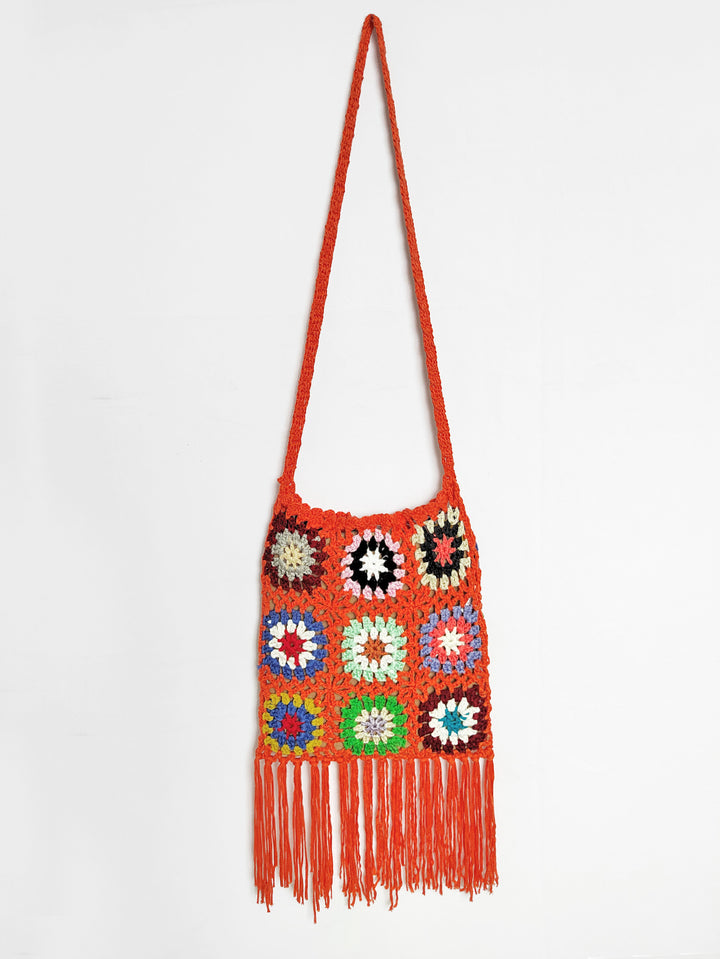 Women crocheted shoulder bag with colorful floral patterns and fringes Mune Fashion