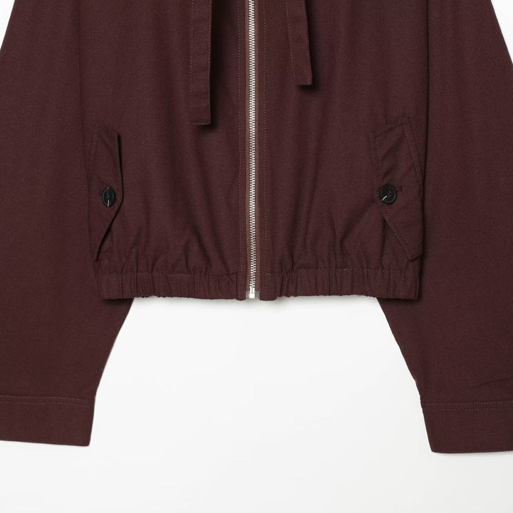 Women's short bomber-style jacket with high funnel collar, concealed zipper, and flap pockets Mune Fashion
