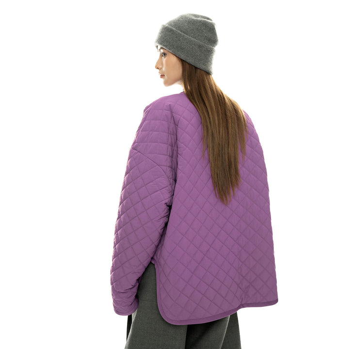 Women’s light padded oversized quilted jacket with round neckline and patch pockets Mune Fashion