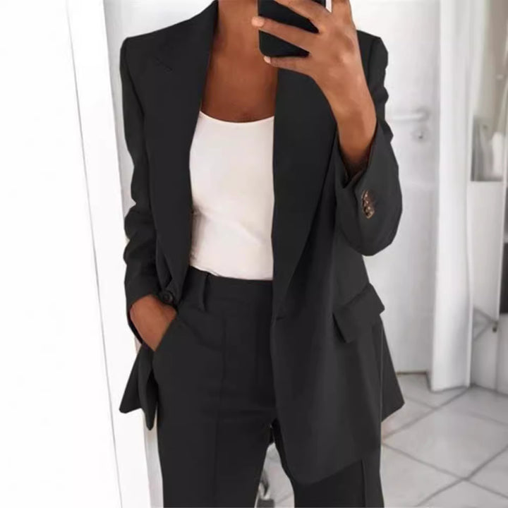 Women's nan Business Blazer Set with structured oversized silhouette, notched collar and pleated trousers Mune Fashion