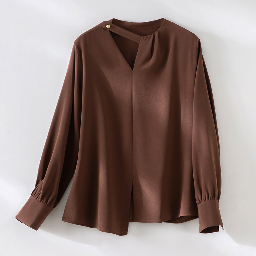 Women's elegant oversized blouse with asymmetrical V-neck and cuffed sleeves Mune Fashion