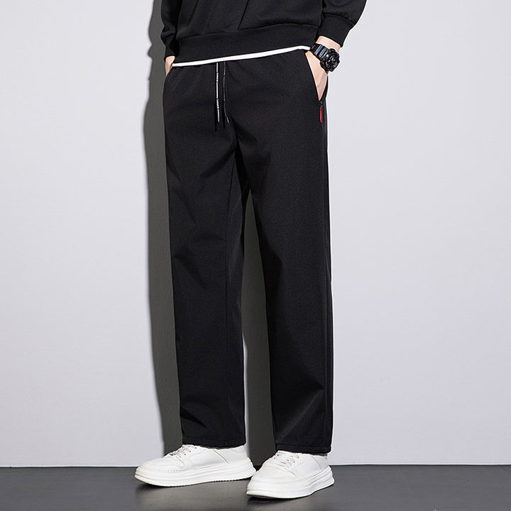 Men's straight-cut leisure and jogging pants with elastic waistband, drawstring, and secure zipper pockets Mune Fashion