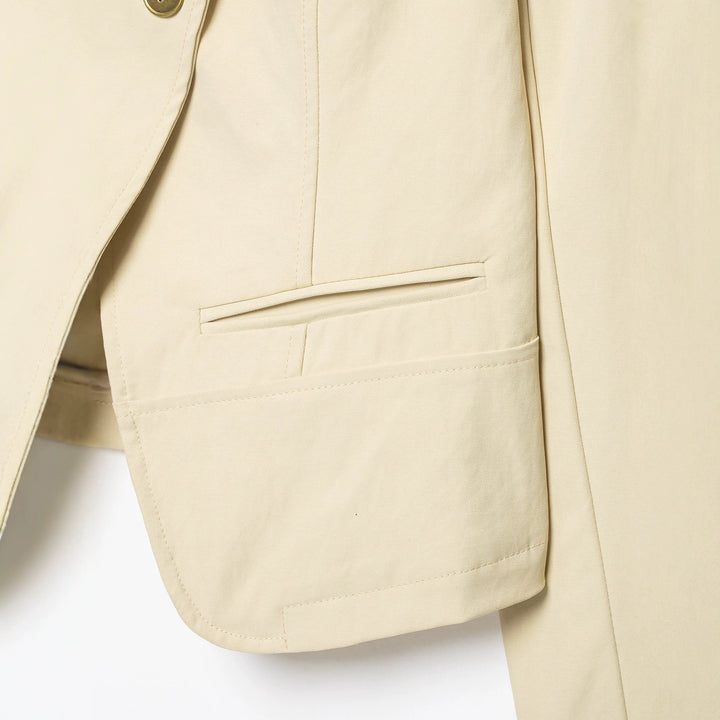 Women's short blazer with asymmetrical button placket and high standing collar Mune Fashion