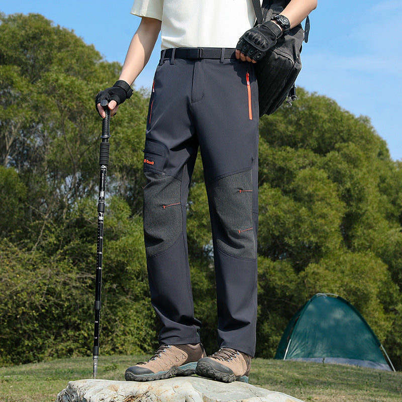Men's water-repellent softshell trekking pants with reinforced knee flex zones and concealed zipper pockets Mune Fashion