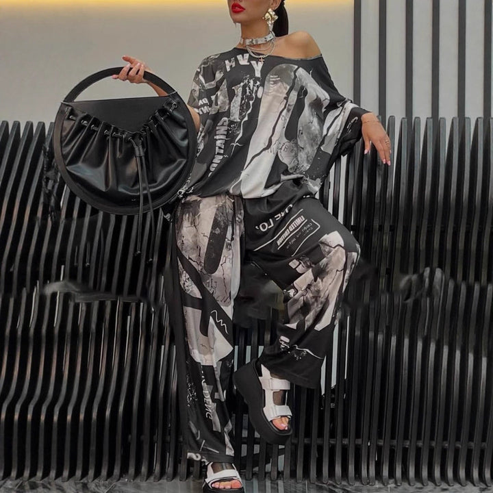 Ladies two-piece wide satin leisure set with off-shoulder batwing top and palazzo pants Mune Fashion