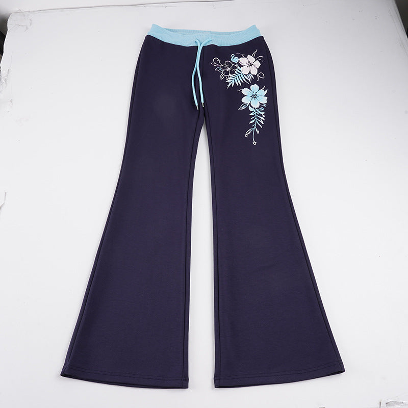 Women’s flared lounge pants with high stretch waistband, drawstring and floral print Mune Fashion