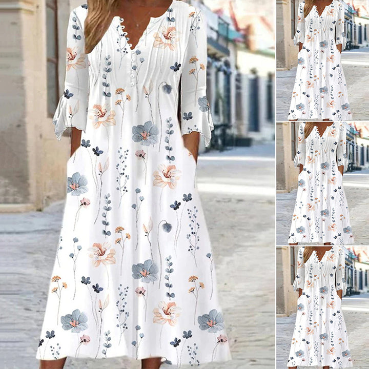Women flowing midi dress with V-neck, decorative button placket, chest pleats, bow sleeves and side pockets Mune Fashion