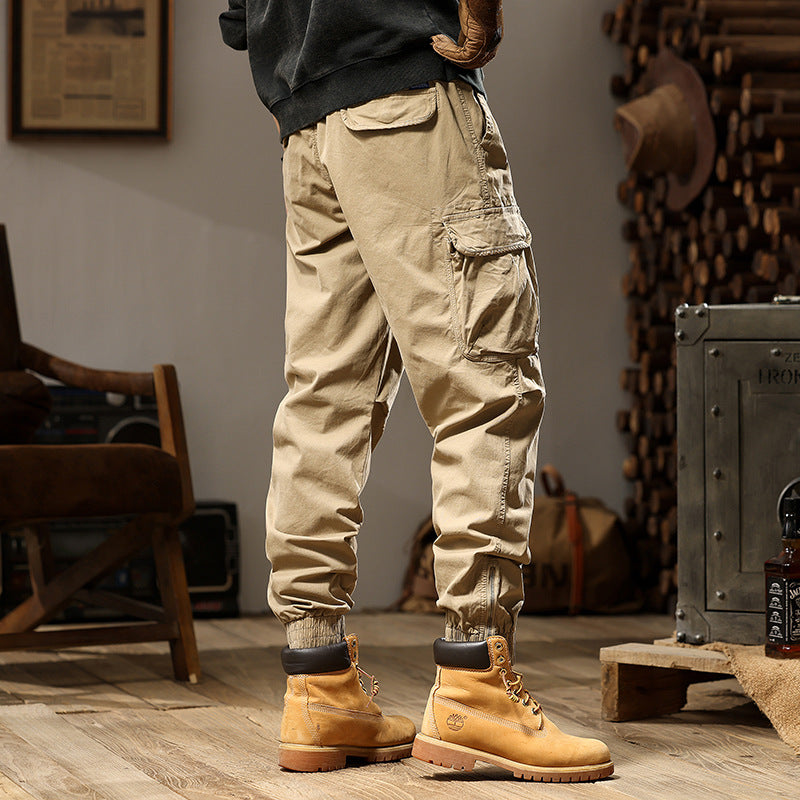 Herren Konisch geschnittene Utility-Cargo-Jogginghose mit Tunnelzugbund, Klapptaschen und Knöchelreißverschlüssen Mune Fashion