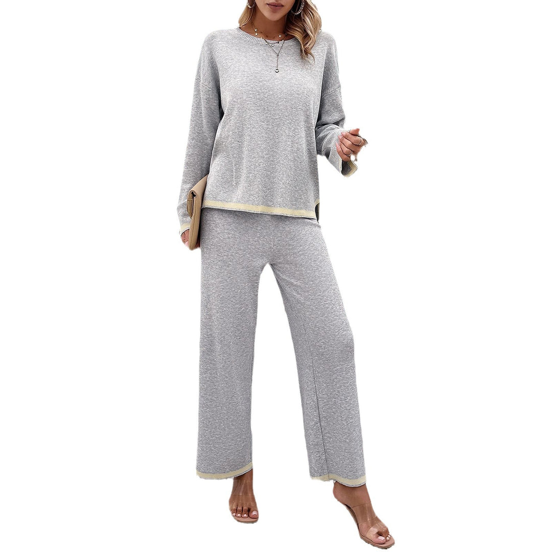 Women's relaxed lounge set with soft round neckline, contrasting piping, and wide palazzo pants Mune Fashion