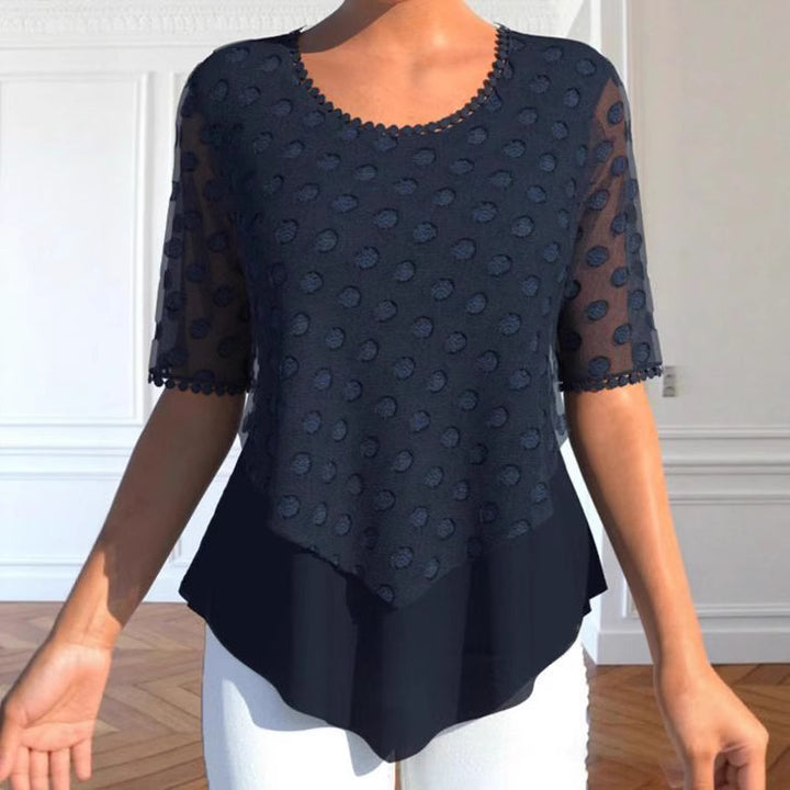 Ladies tulle blouse with embroidered dots, semi-transparent sleeves and asymmetrical tiered hem Mune Fashion