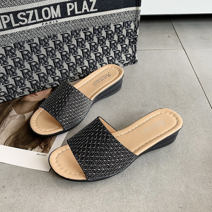 Women's glitter slide sandals with wide strap front, open toe area, cushioned comfort footbed, and lightweight wedge heel Mune Fashion
