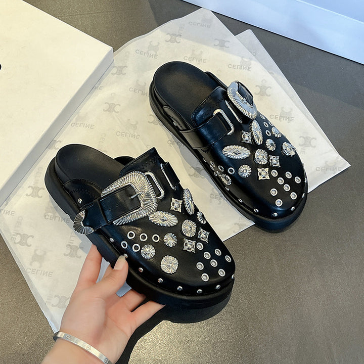 Ladies' leather platform mules with decorative eyelets and decorative buckle application Mune Fashion