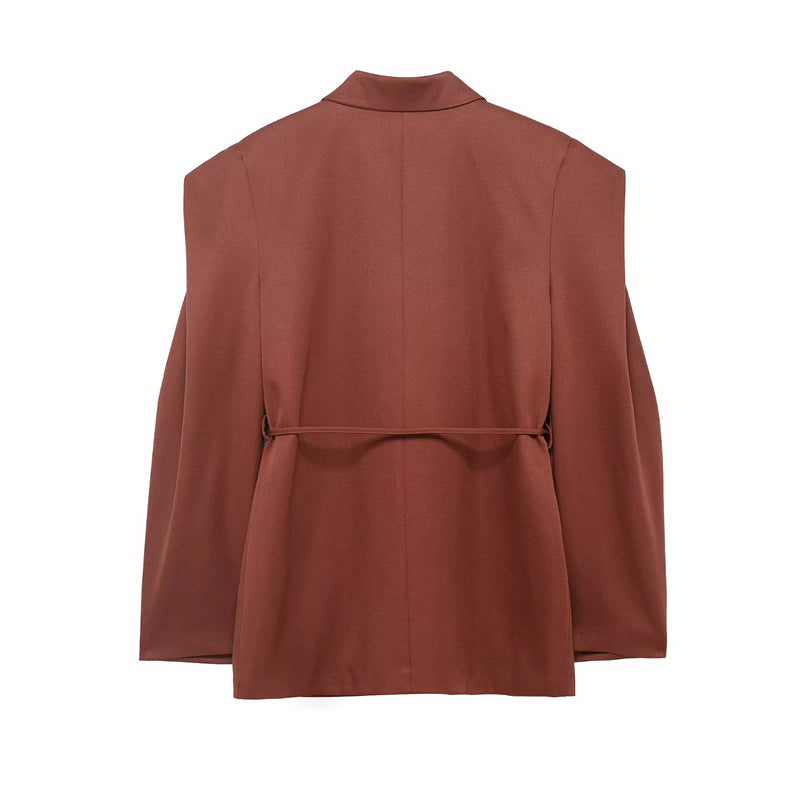 Women's tailored blazer with distinctive shoulder pads, tie belt and flap pockets Mune Fashion