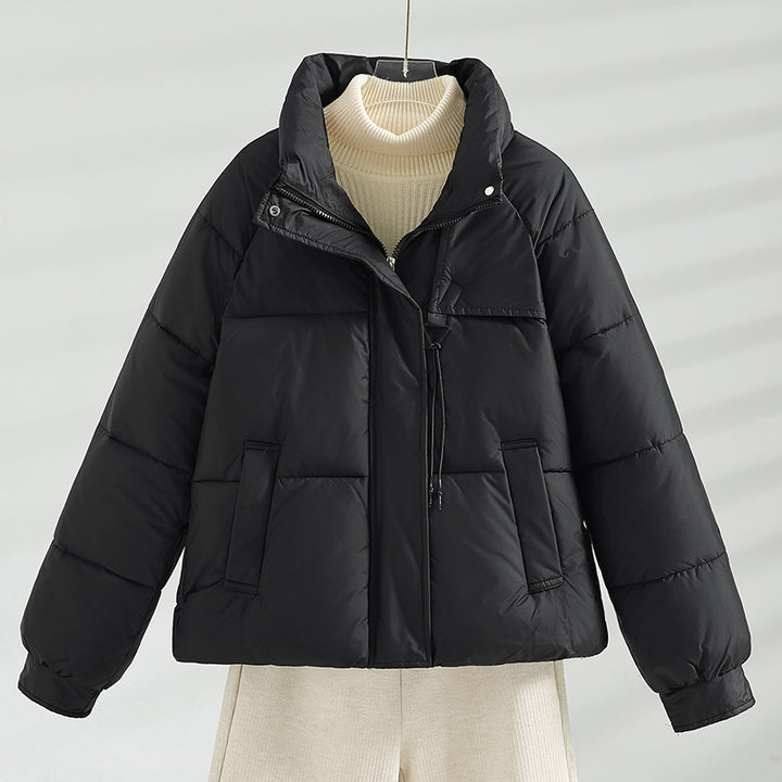 Women's non-short padded boxy jacket with high stand-up collar, drawstring chest closure, and slanted flap pockets Mune Fashion