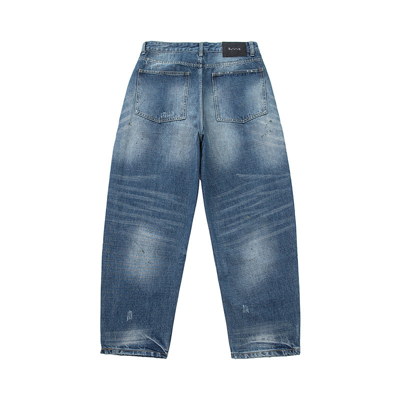 Women's loosely cut high-waisted jeans in a used look with frayed details and decorative seams Mune Fashion