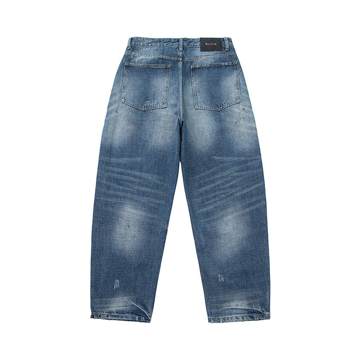 Women's loosely cut high-waisted jeans in a used look with frayed details and decorative seams Mune Fashion
