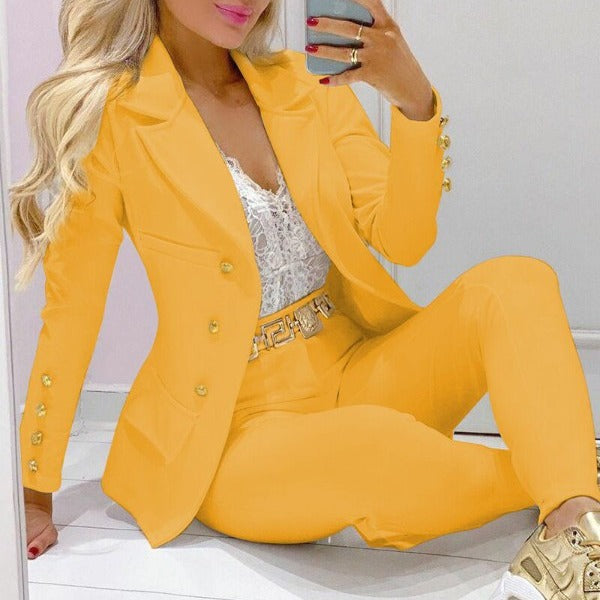 Women's fitted double-breasted blazer set with gold button detail and high-waisted slim pants Mune Fashion
