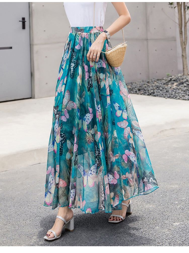 Women long pleated maxi skirt with floral summer print and elastic waistband Mune Fashion