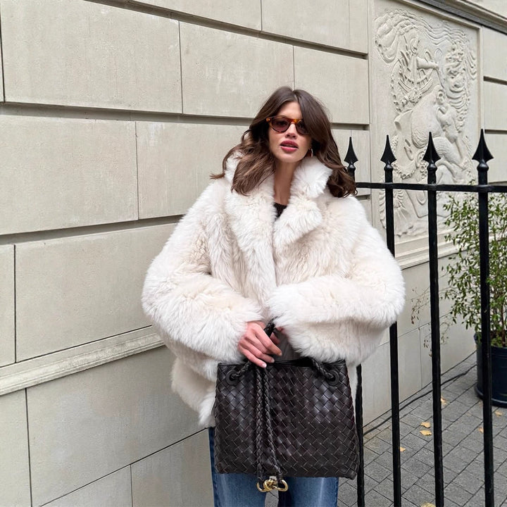 Women's short coat made of voluminous faux fur with a rounded shawl collar and boxy silhouette Mune Fashion